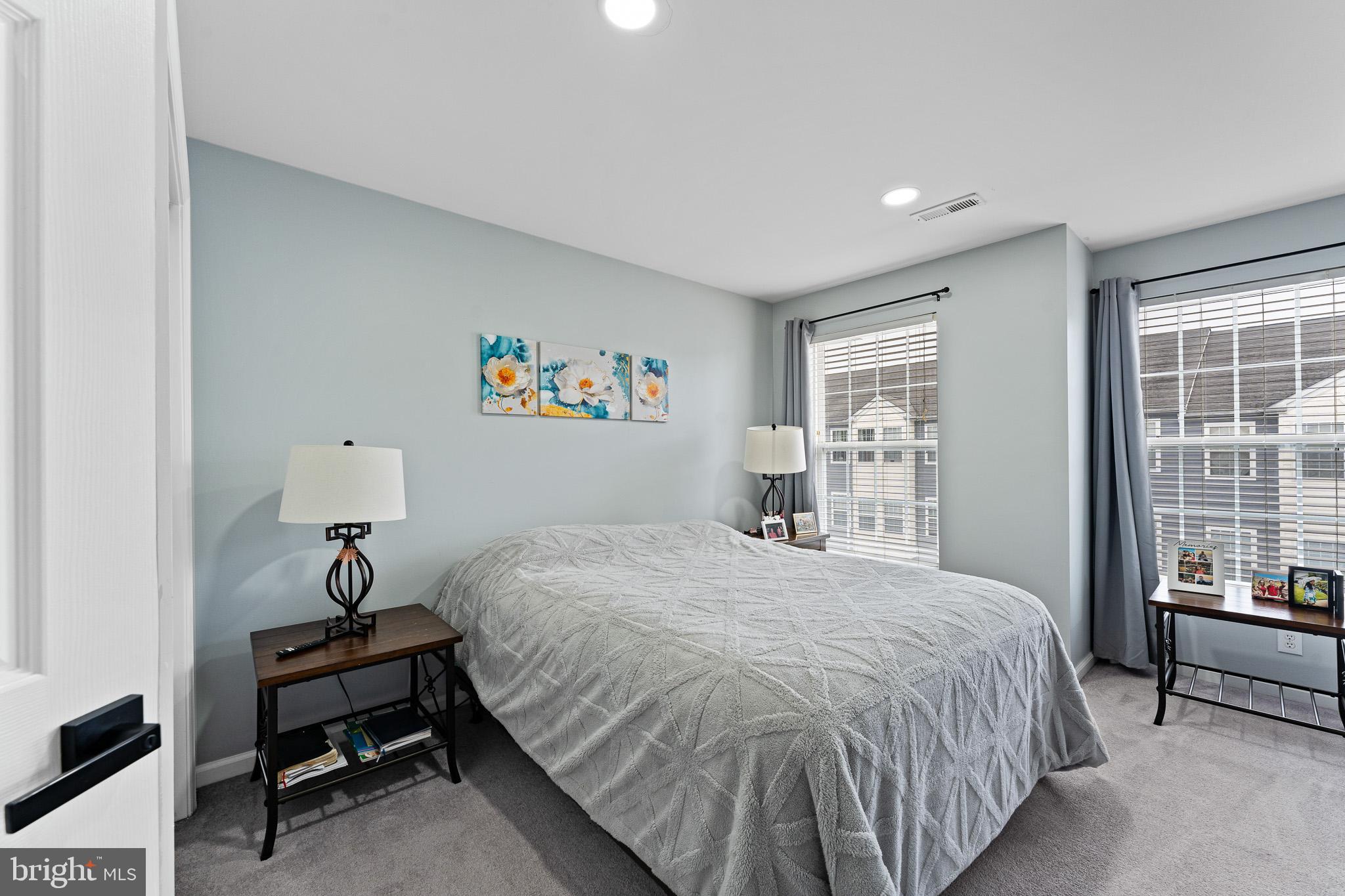 11 Teal Court Riverside, NJ 08075 - Photo 14 of 33 a bedroom with a bed and a window
