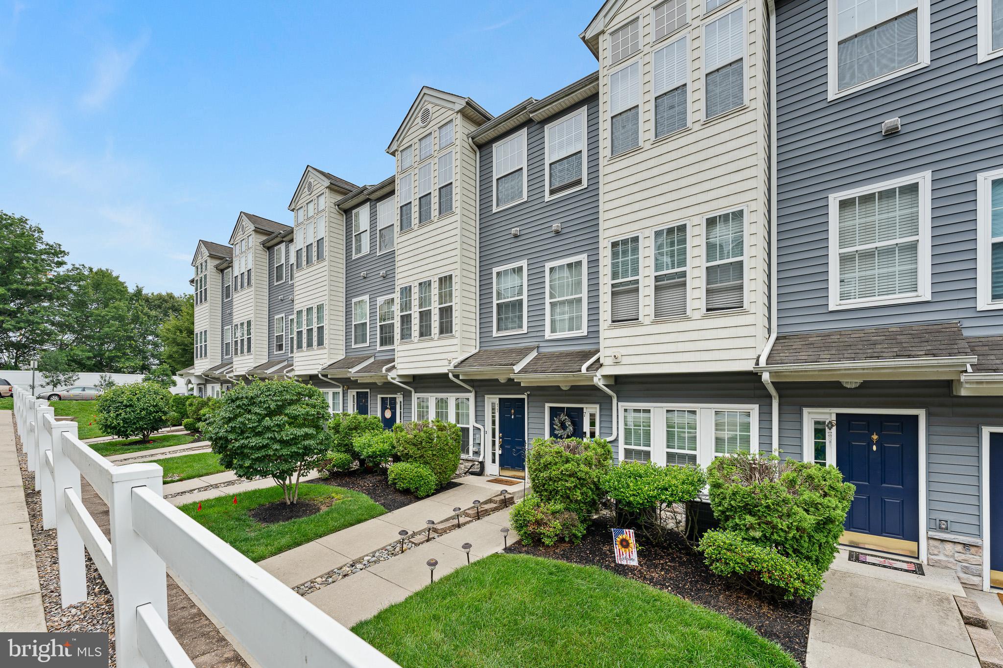 11 Teal Court Riverside, NJ 08075 - Photo 2 of 33 a front view of a building with garden