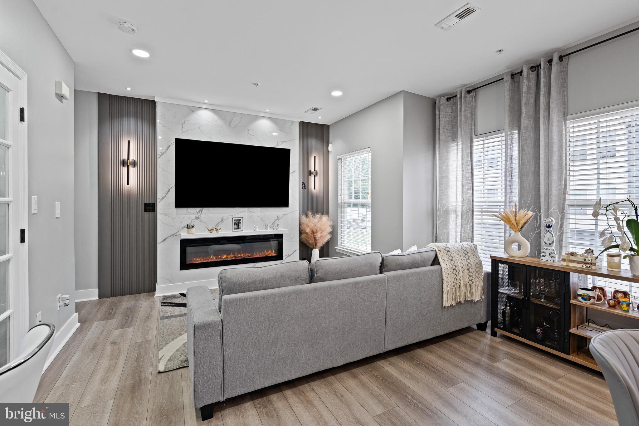 11 Teal Court Riverside, NJ 08075 - Photo 8 of 33 a living room with furniture and a flat screen tv