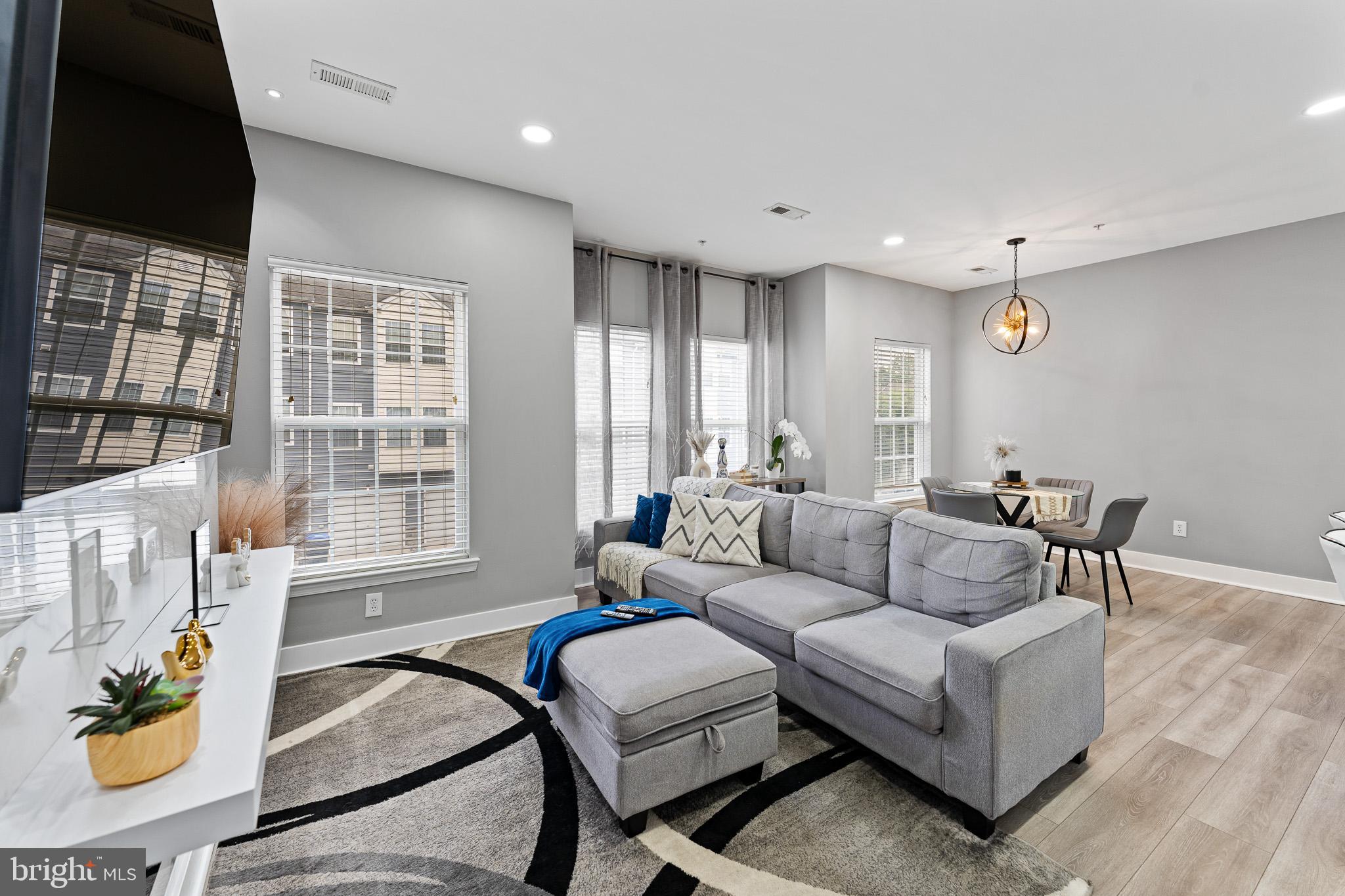 11 Teal Court Riverside, NJ 08075 - Photo 9 of 33 a living room with furniture and a large window