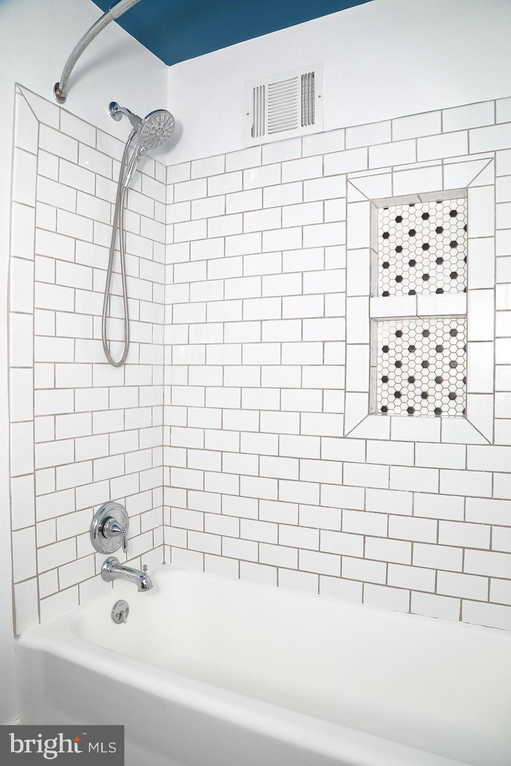 303 Euclid Avenue Lancaster, PA 17603 - Photo 22 of 24 a bathroom with a bathtub and shower
