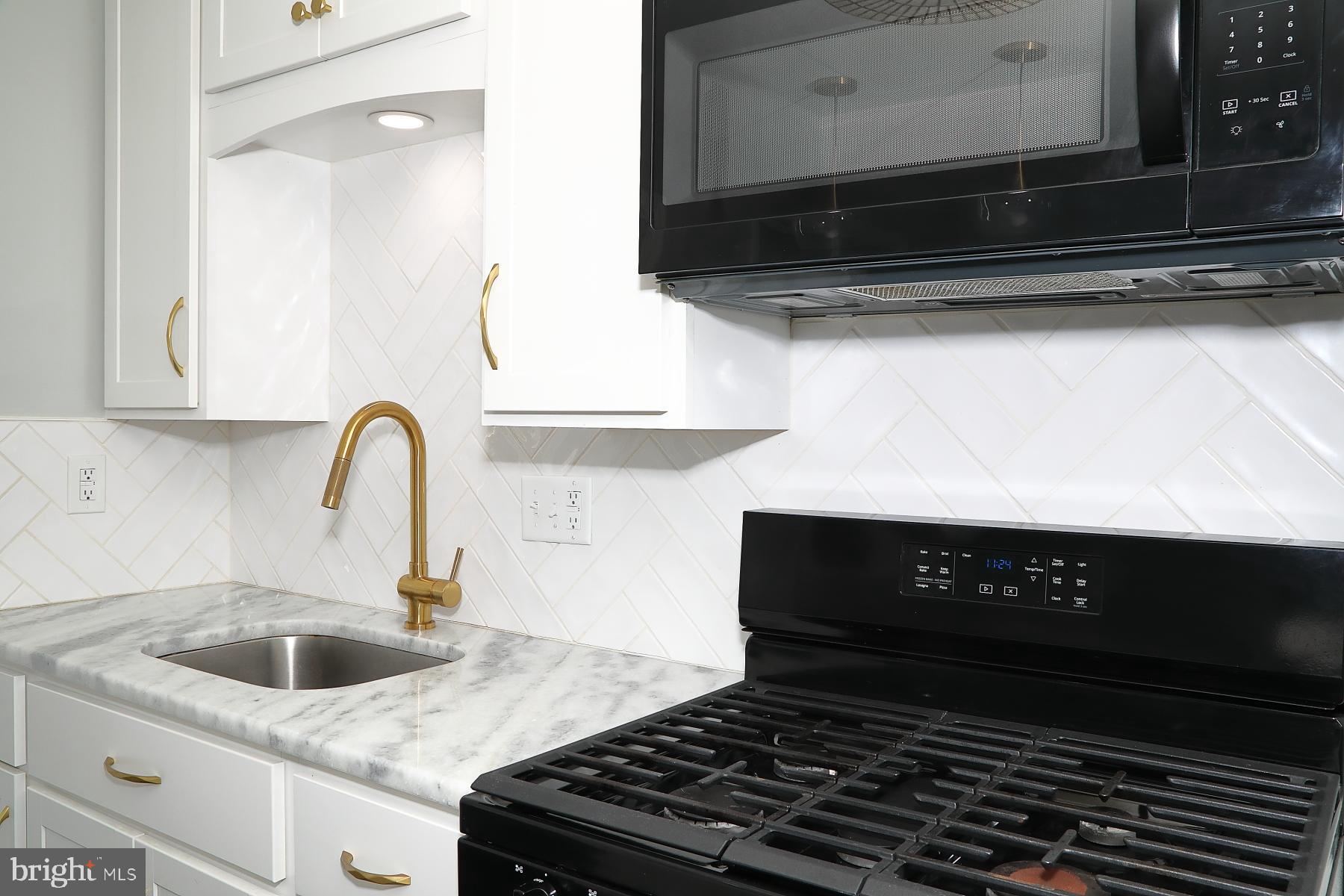 303 Euclid Avenue Lancaster, PA 17603 - Photo 8 of 24 a kitchen with a sink and cabinets