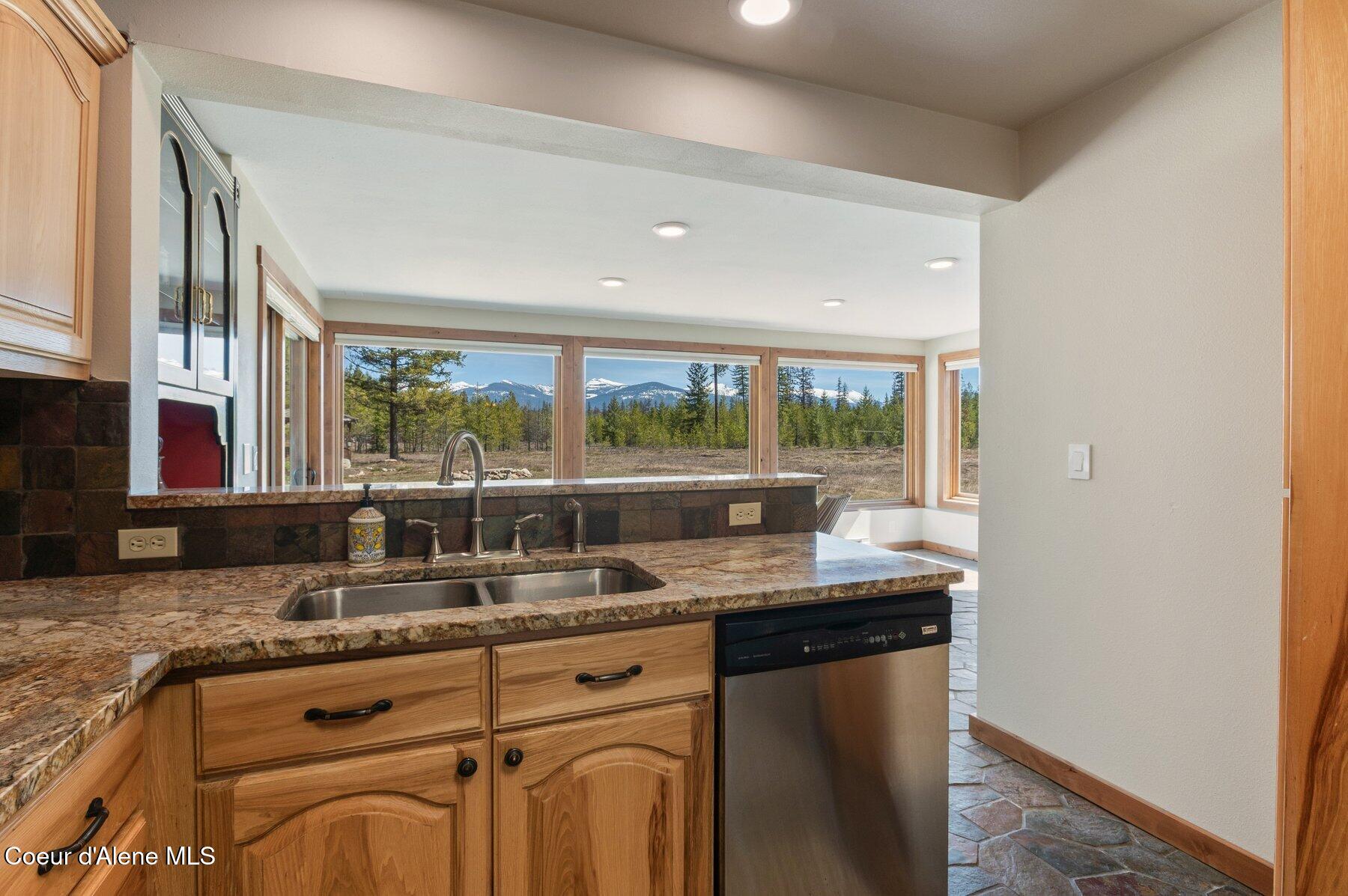 762 Reeder Bay Road Nordman, ID 83848 - Photo 21 of 74 Kitchen looking into Sunroom Main Home