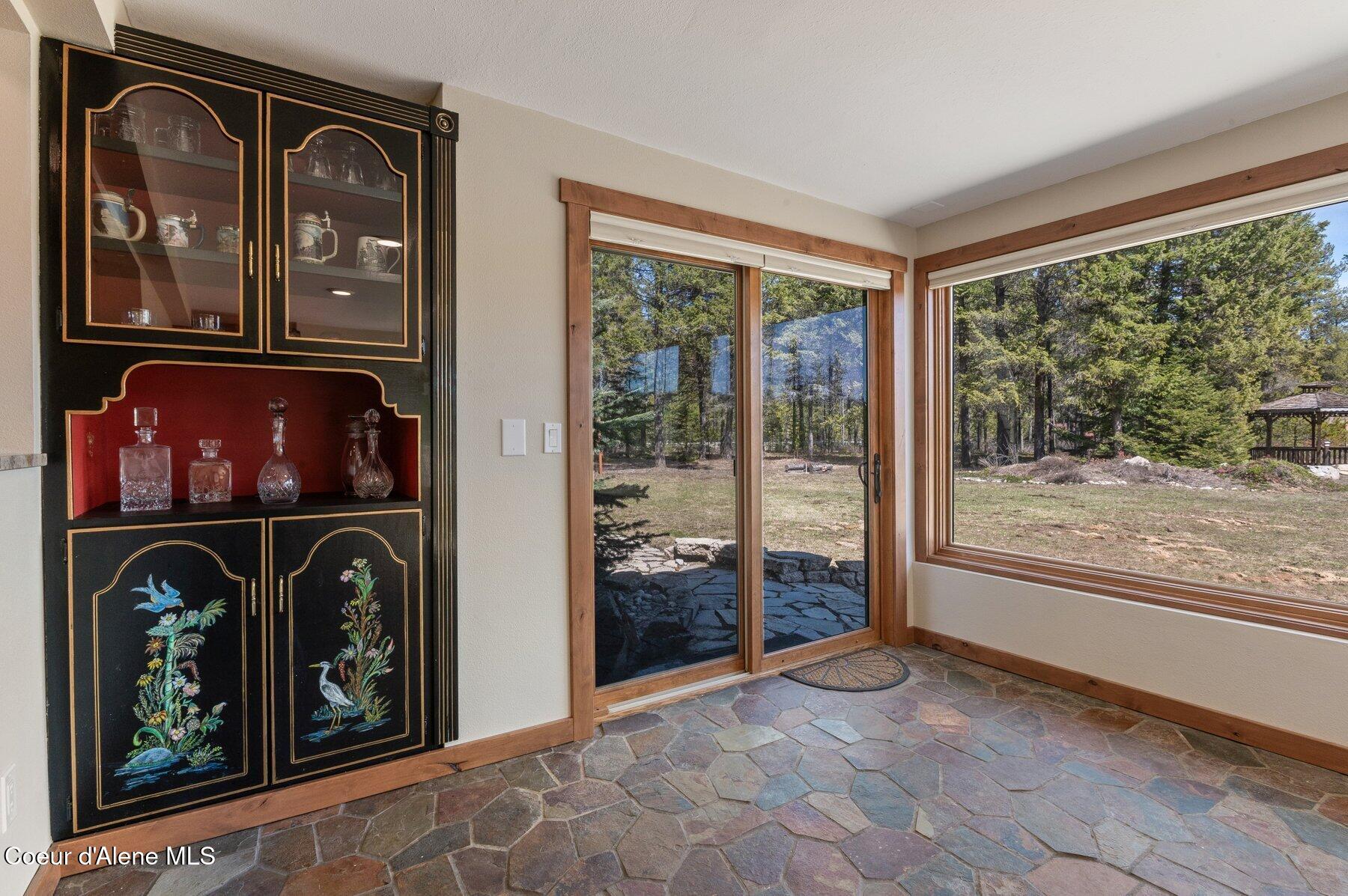 762 Reeder Bay Road Nordman, ID 83848 - Photo 23 of 74 Sunroom Main Home