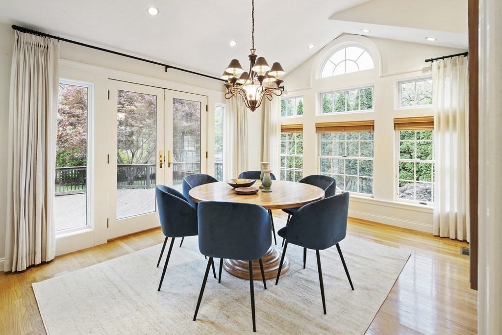 77 Bloomfield Street Lexington, MA 02421 - Photo 7 of 19 a view of a dining room with furniture wooden floor and chandelier