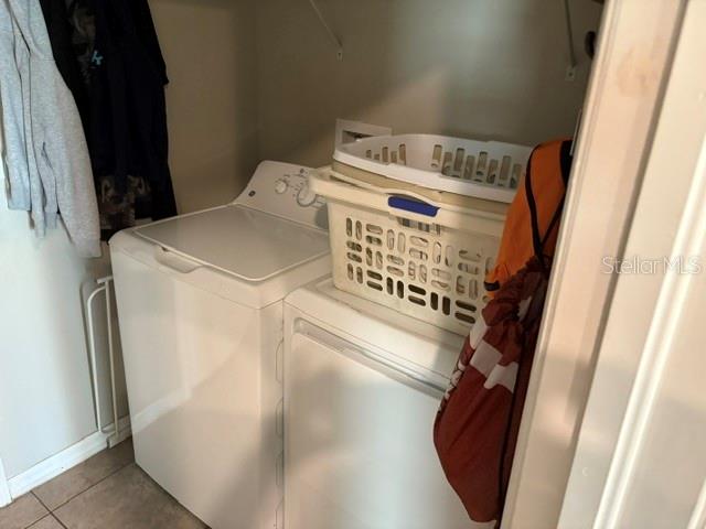 9616 Lemon Drop Loop Sun City Center, FL 33573 - Photo 21 of 48 a view of washer and dryer