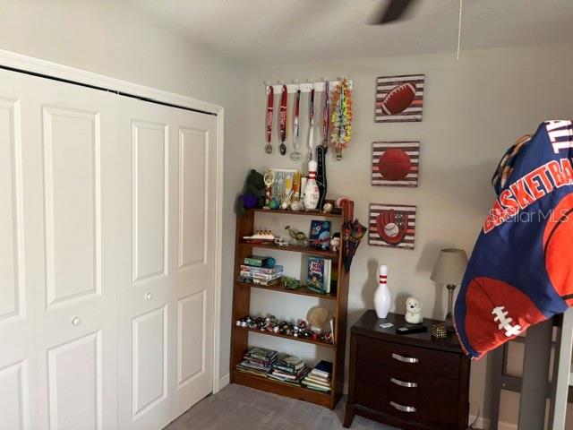 9616 Lemon Drop Loop Sun City Center, FL 33573 - Photo 39 of 48 a view of kids room with toys and a window