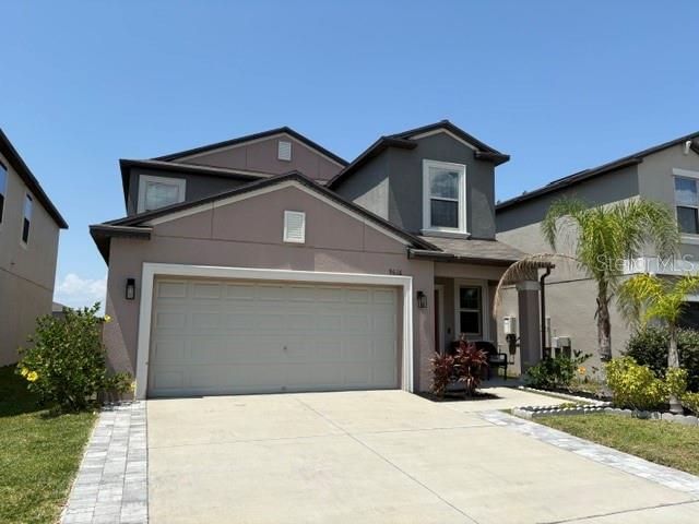 9616 Lemon Drop Loop Sun City Center, FL 33573 - Photo 4 of 48 a house view with a outdoor space