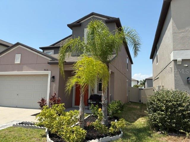 9616 Lemon Drop Loop Sun City Center, FL 33573 - Photo 5 of 48 front view of a house