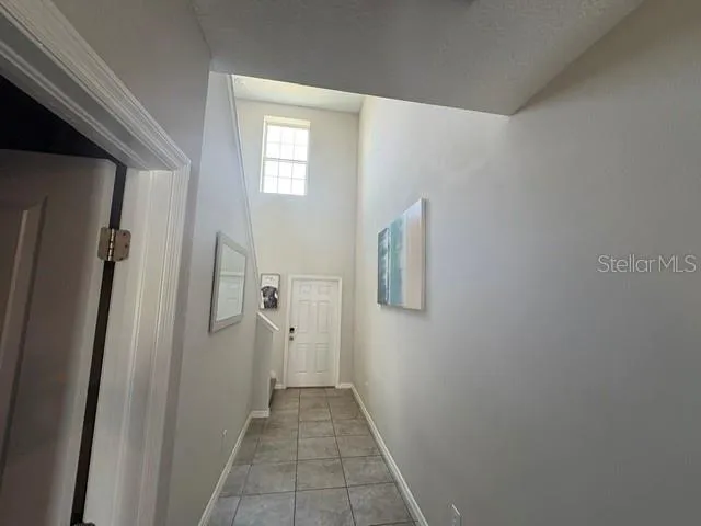 a view of a bathroom from a hallway