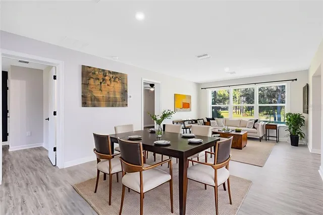 a view of a livingroom with furniture and a window