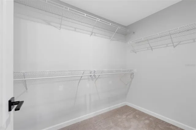 a view of a room with racks on the wall