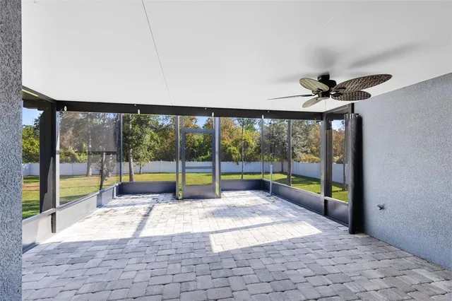 a view of a room with a large window