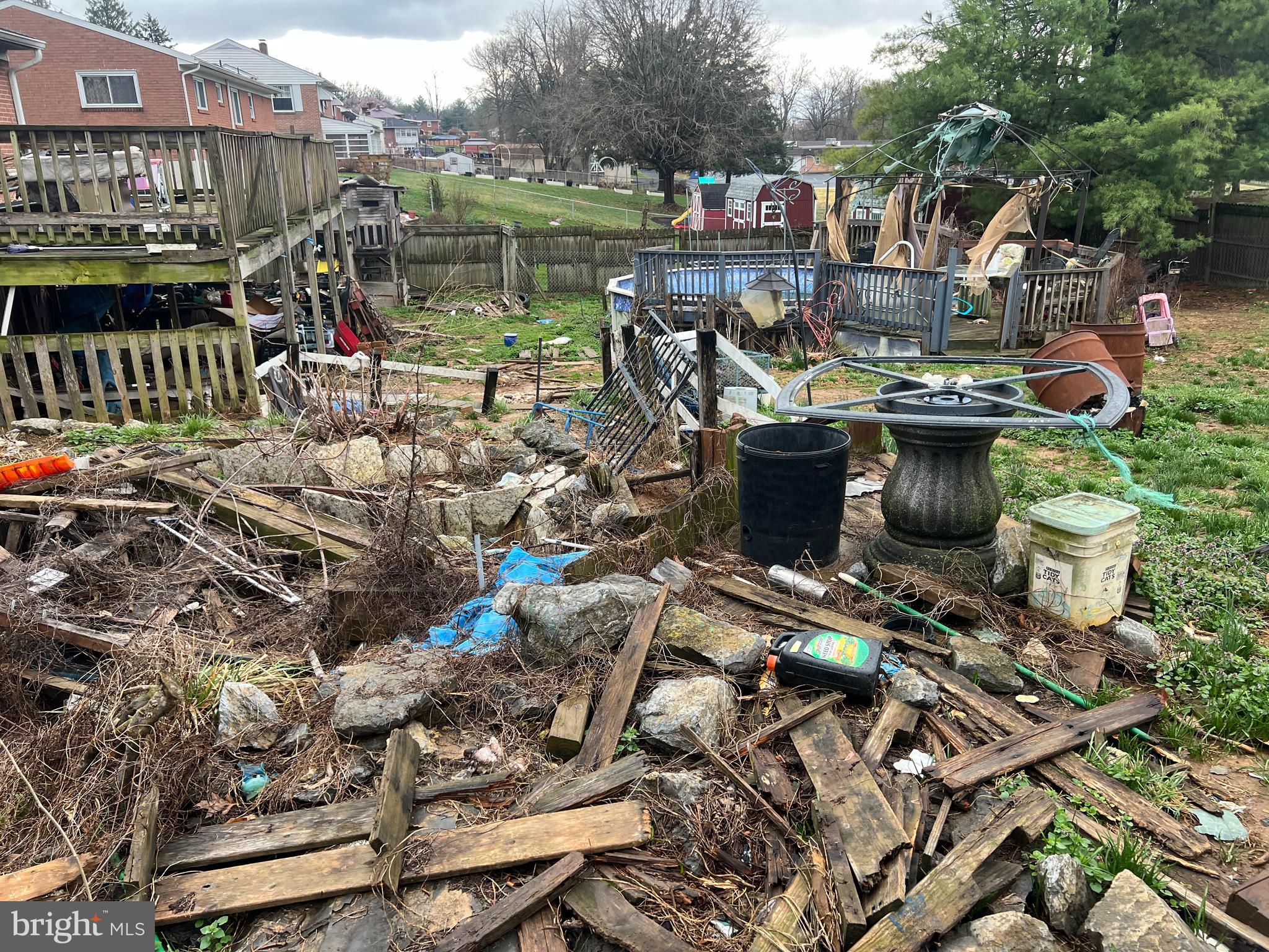 11838 Patrick Road Hagerstown, MD 21742 - Photo 4 of 14 a view of a lake with a chairs and table in the terrace