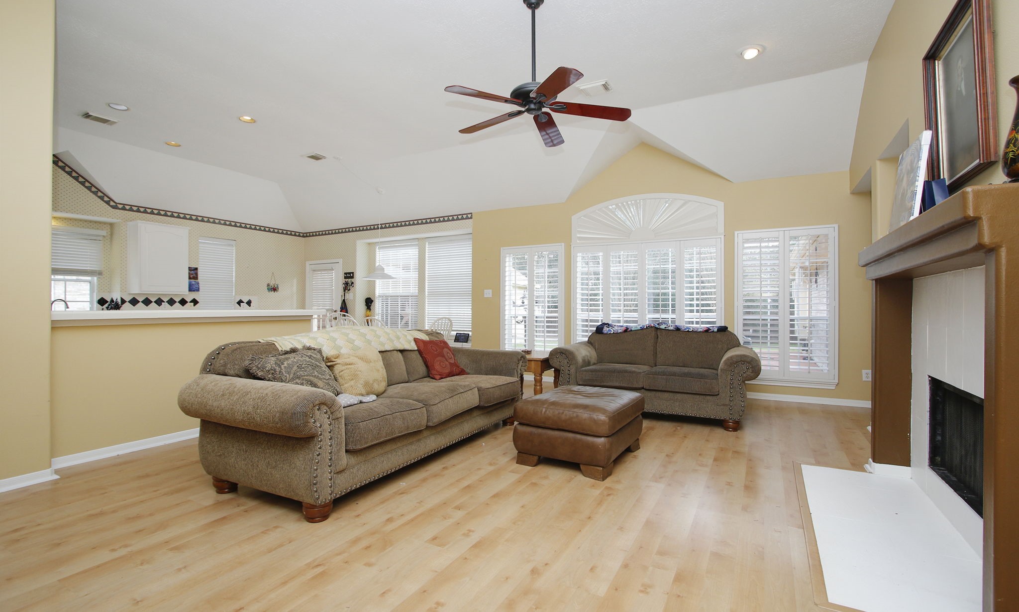 20206 Treetop Lane Spring, TX 77388 - Photo 13 of 42 a living room with furniture and a large window