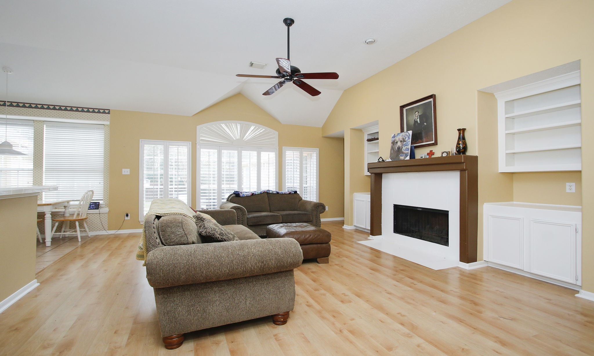 20206 Treetop Lane Spring, TX 77388 - Photo 14 of 42 a living room with furniture and a fireplace