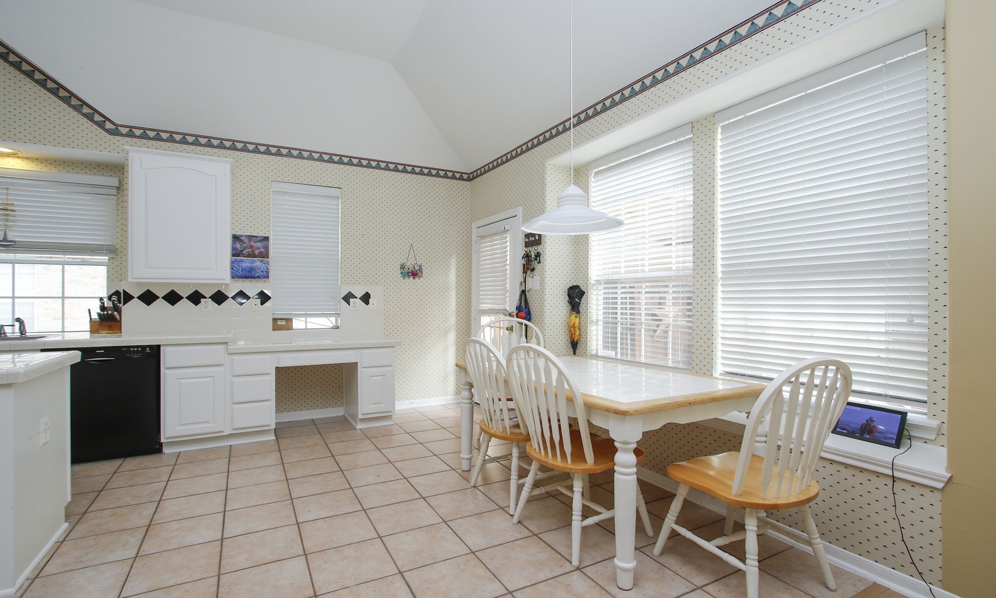 20206 Treetop Lane Spring, TX 77388 - Photo 19 of 42 a view of dining table chairs and window