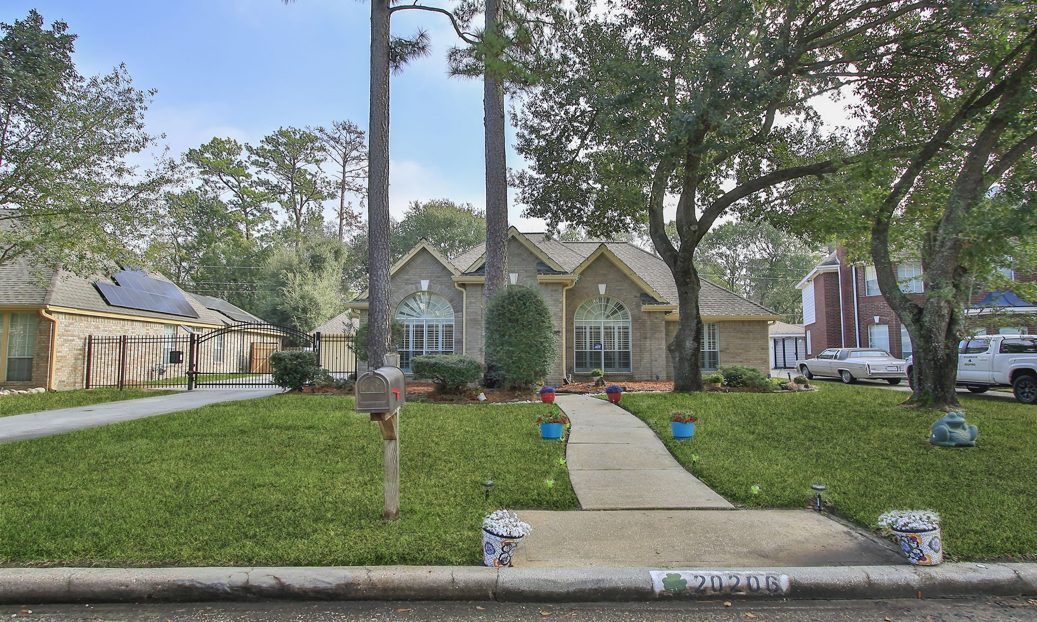 20206 Treetop Lane Spring, TX 77388 - Photo 2 of 42 front view of a house with a yard