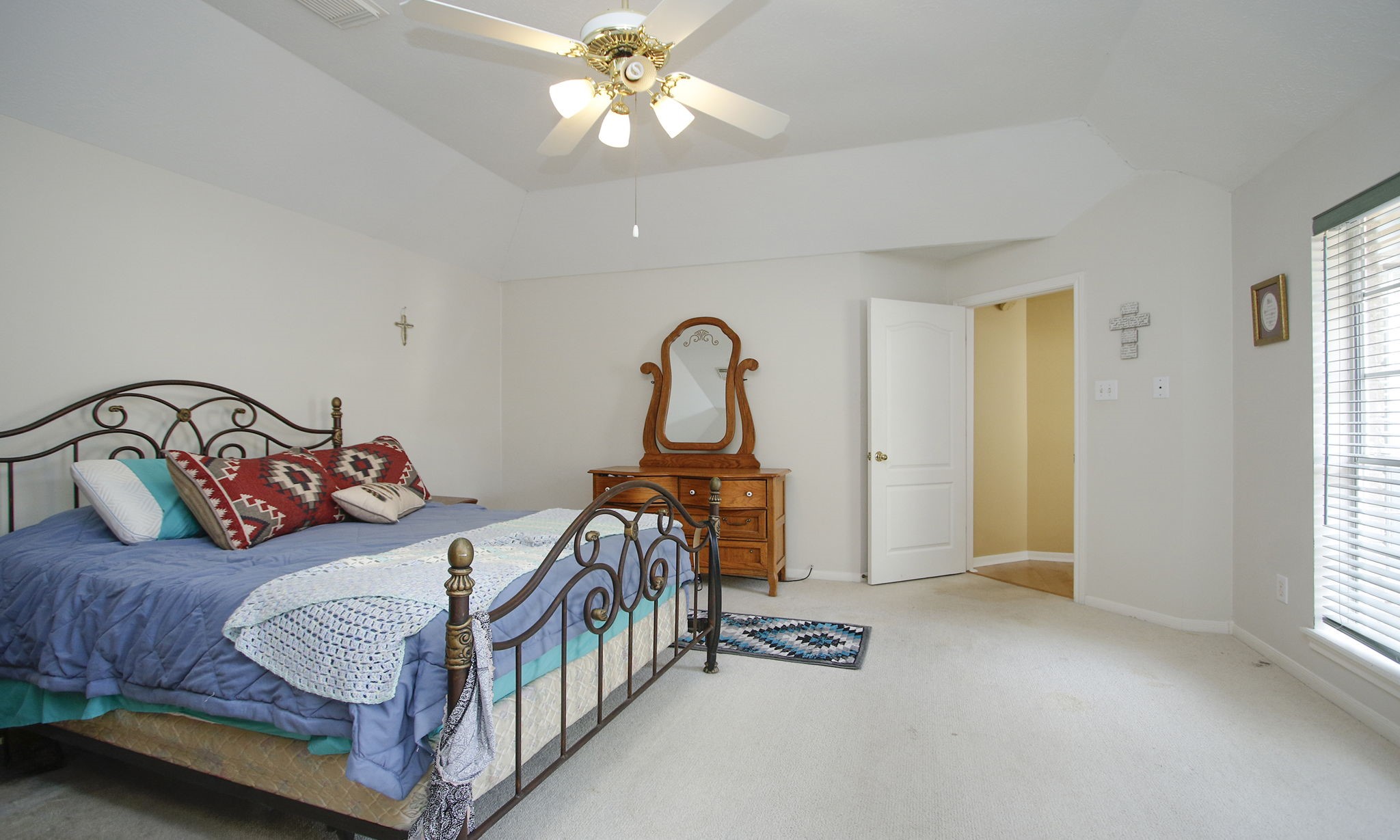20206 Treetop Lane Spring, TX 77388 - Photo 23 of 42 a bedroom with bed and a window