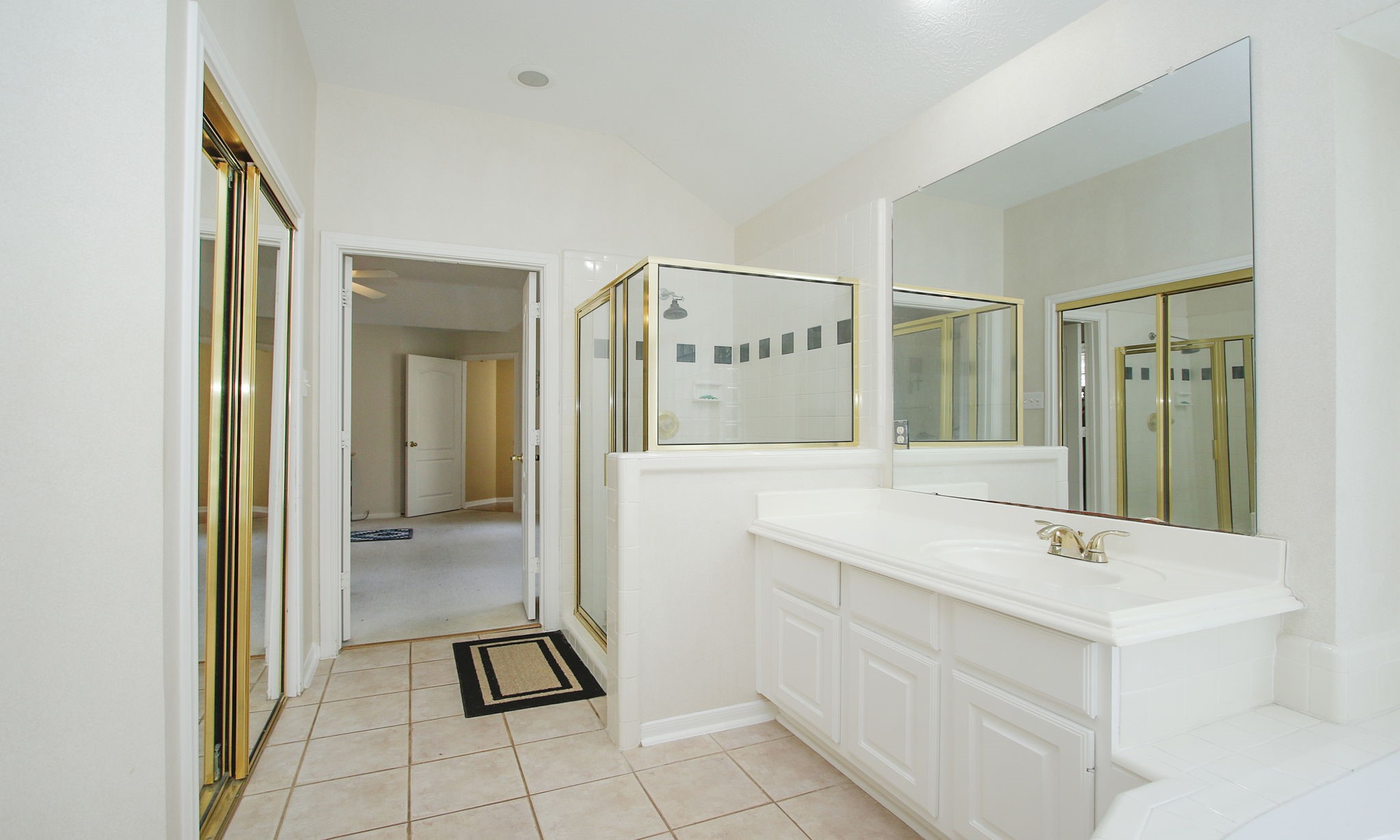 20206 Treetop Lane Spring, TX 77388 - Photo 28 of 42 a bathroom with a sink and a mirror