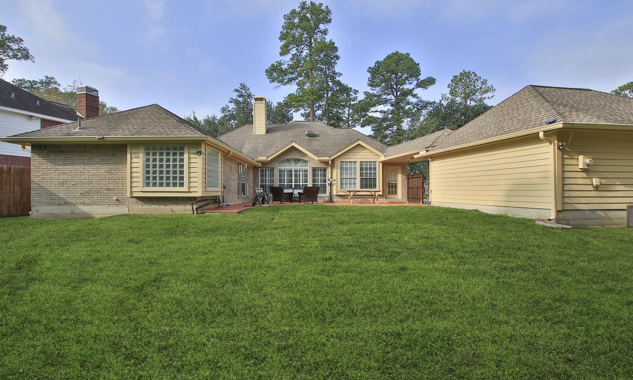 20206 Treetop Lane Spring, TX 77388 - Photo 39 of 42 a front view of a house with a garden
