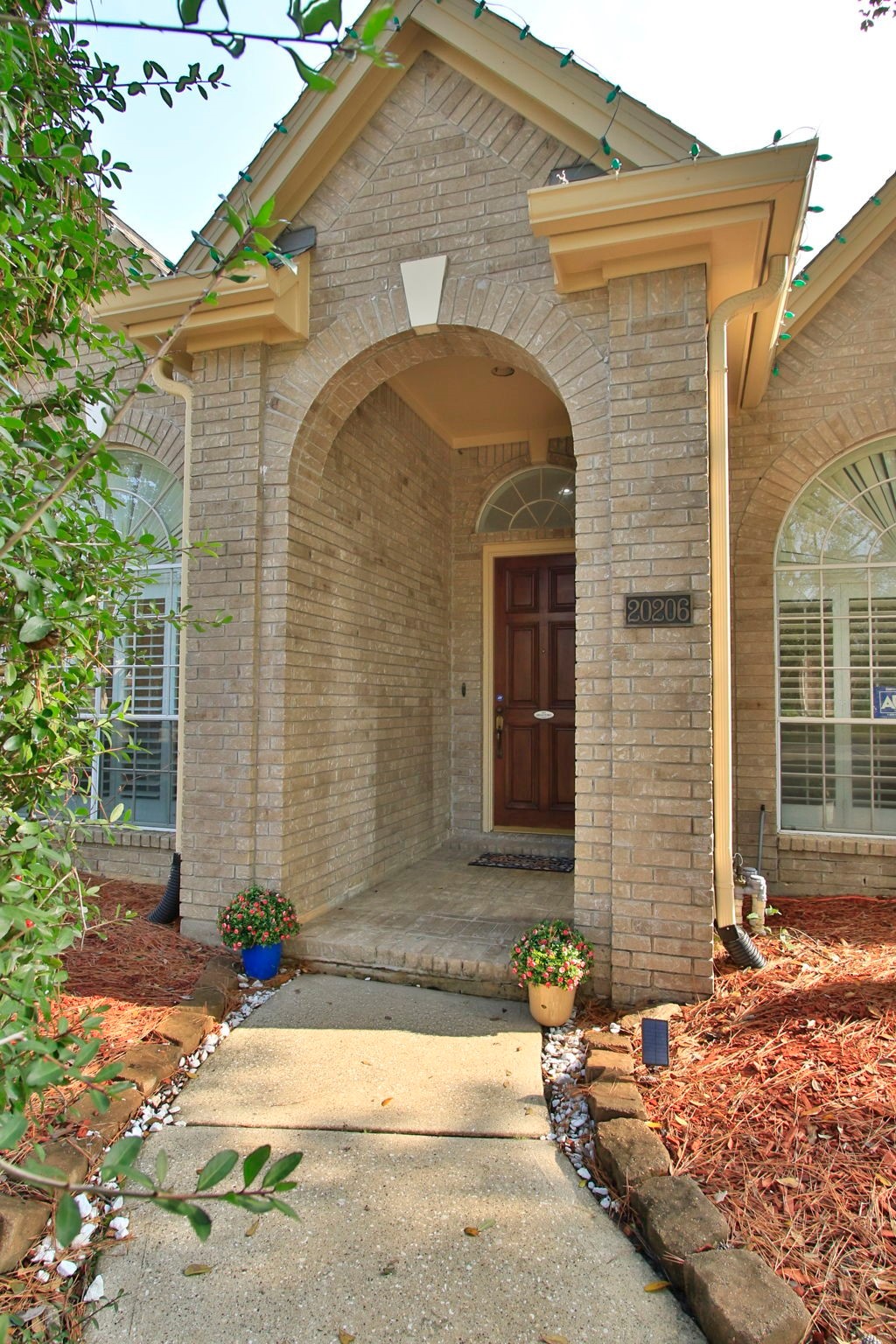 20206 Treetop Lane Spring, TX 77388 - Photo 4 of 42 a front view of a house with a yard