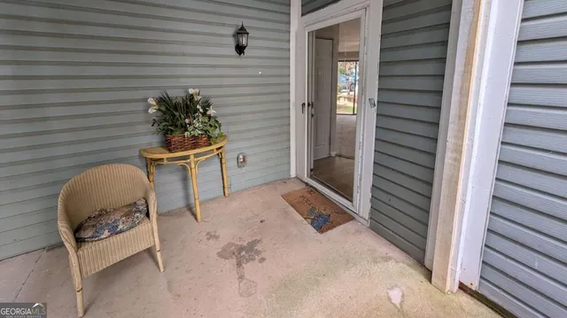 a view of porch with seating space