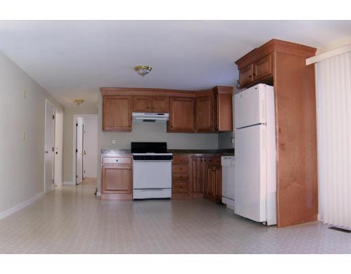 286 Hill Road Groton, MA 01450 - Photo 2 of 6 a kitchen with stainless steel appliances a refrigerator and a stove