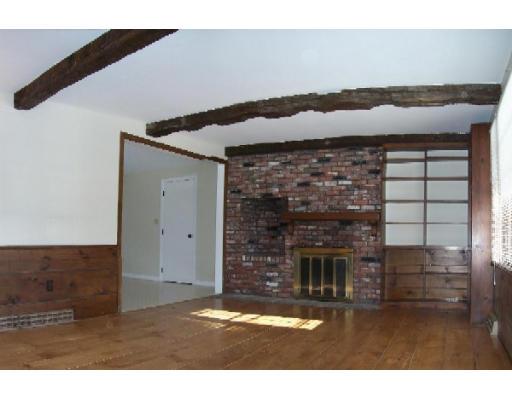 286 Hill Road Groton, MA 01450 - Photo 4 of 6 a kitchen with a sink and a fireplace