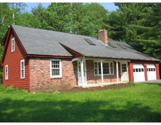 286 Hill Road Groton, MA 01450 - Photo 6 of 6 a front view of a house with a yard
