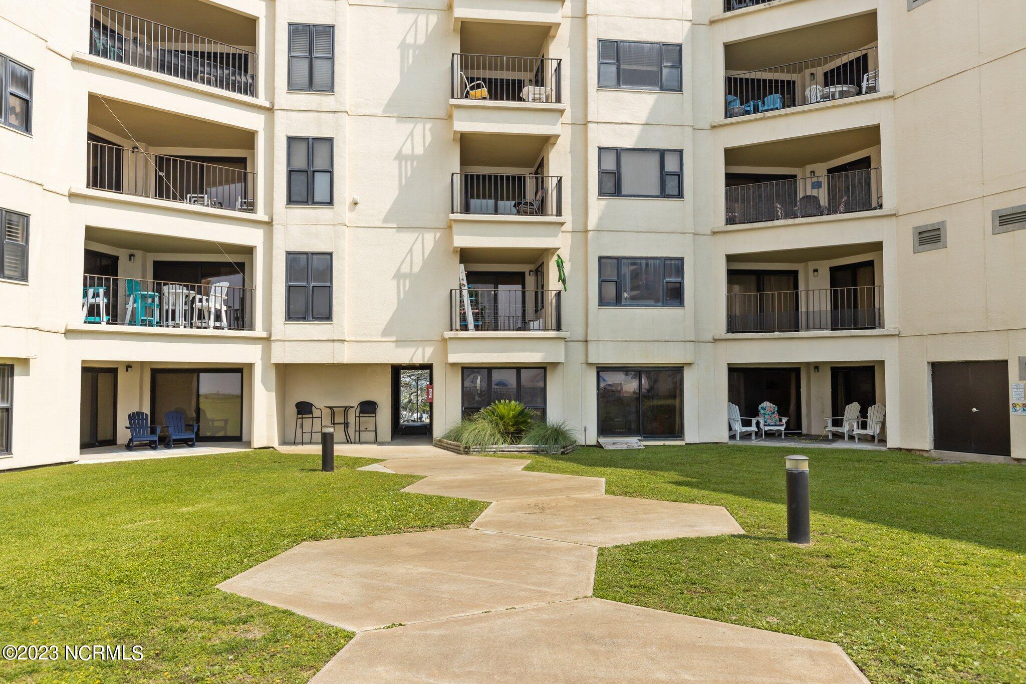 1505 Salter Path Road, Unit 238 Indian Beach, NC 28512 - Photo 3 of 49 Courtyard area at pool side