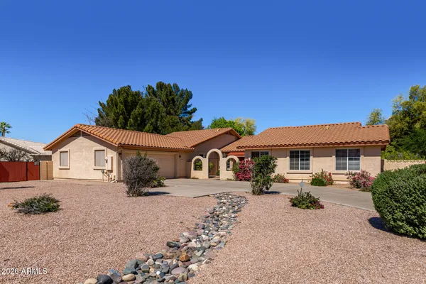 front view of a house with a patio