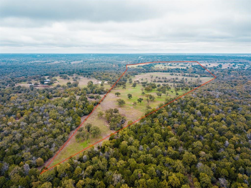 303 Bob's Trail Bastrop, TX 78602 - Photo 3 of 11 an aerial view of residential building and trees