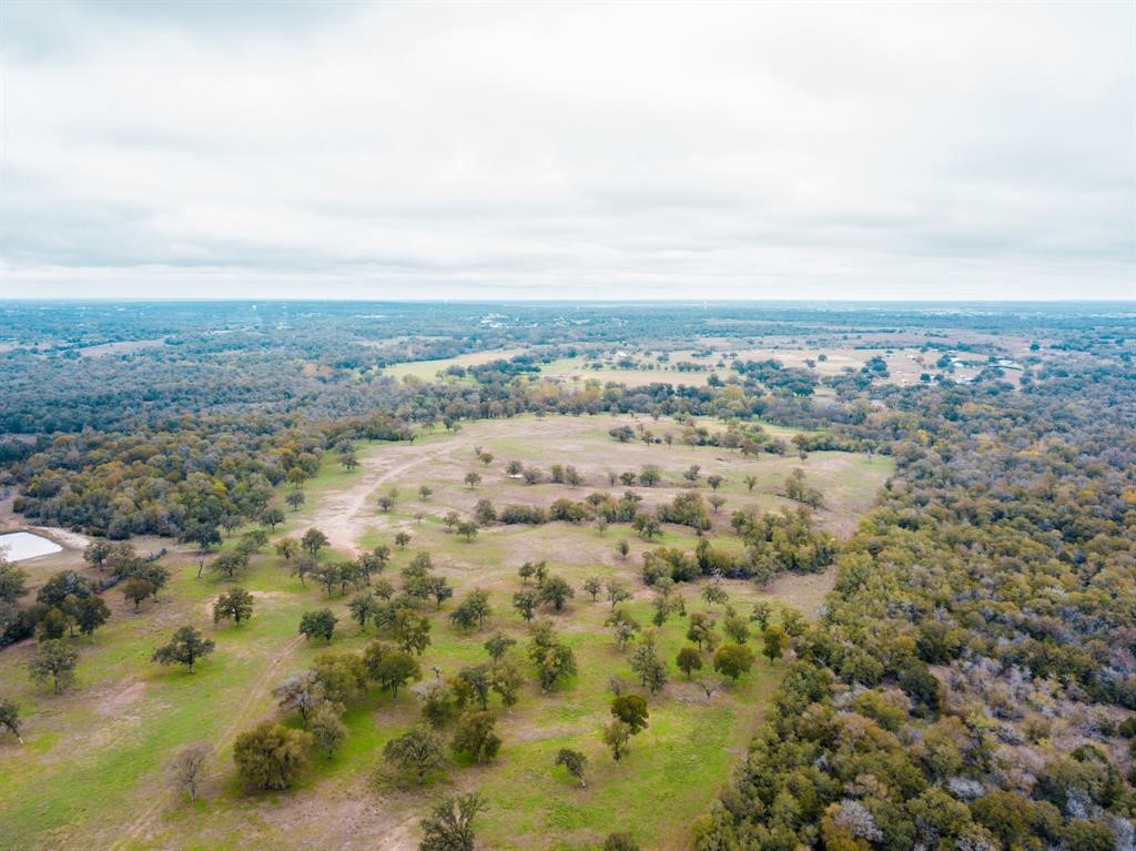303 Bob's Trail Bastrop, TX 78602 - Photo 7 of 11 a view of beach and city view