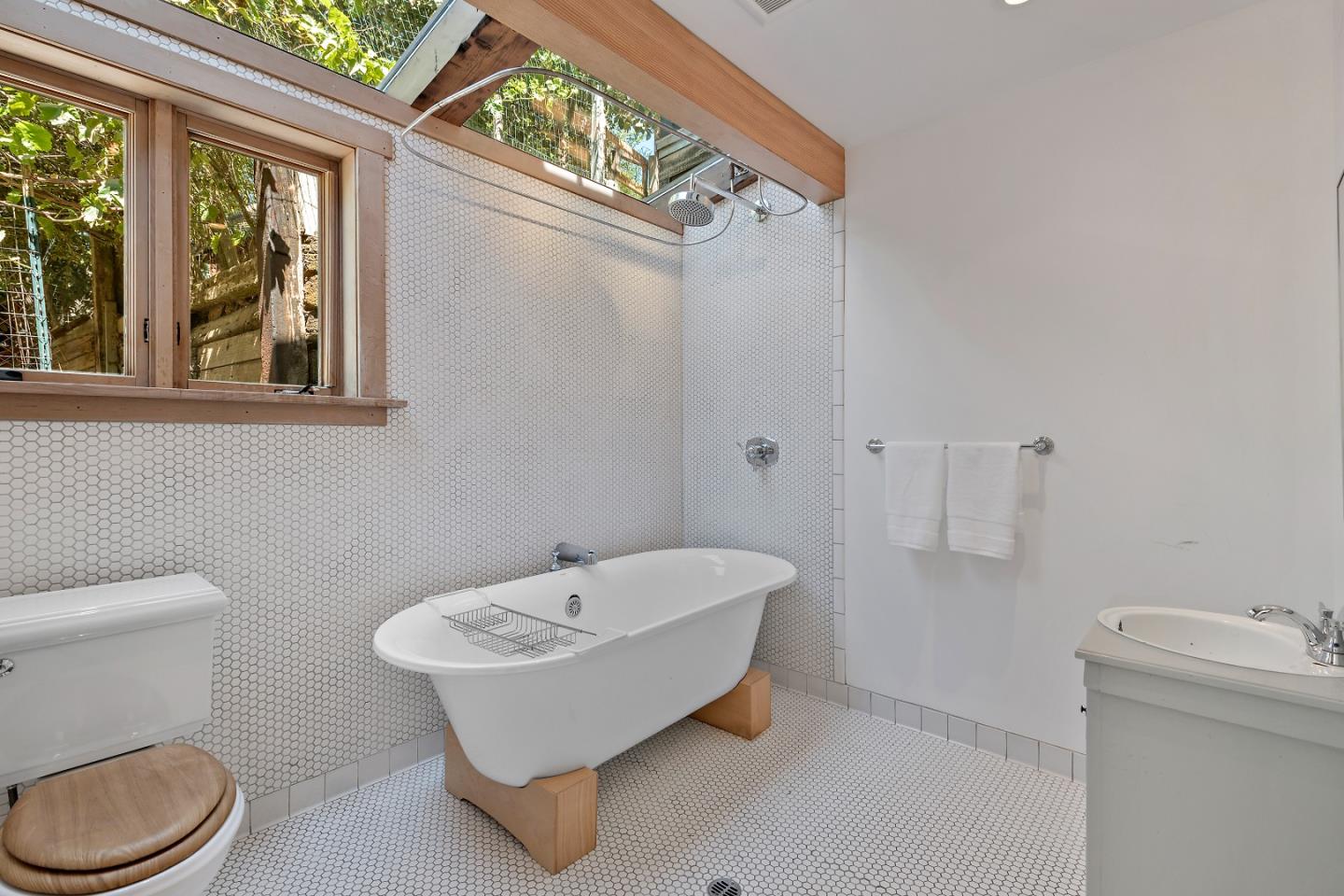 41 Skyline Drive Woodside, CA 94062 - Photo 18 of 30 a bathroom with a sink and a toilet