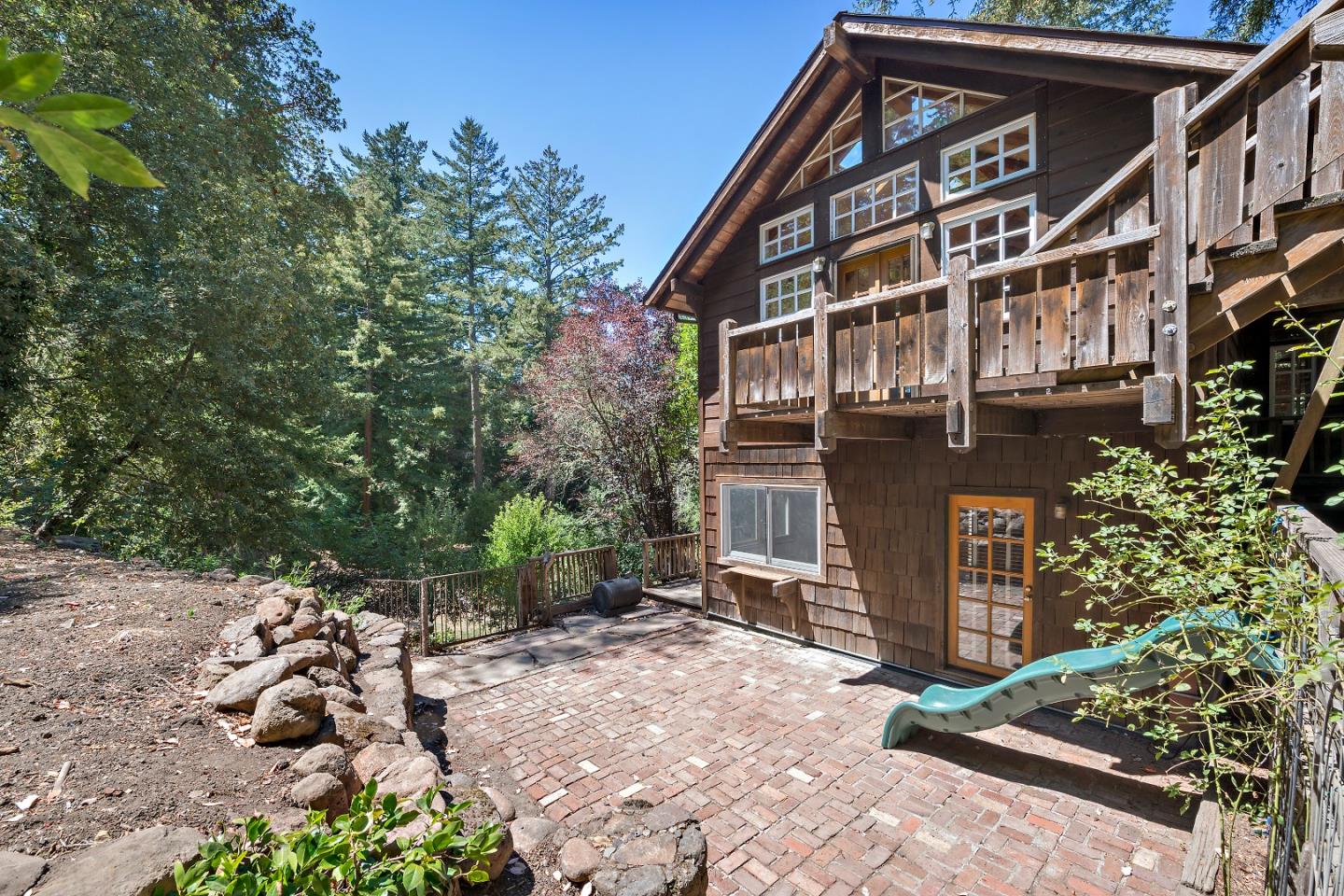 41 Skyline Drive Woodside, CA 94062 - Photo 27 of 30 a view of a house with a yard