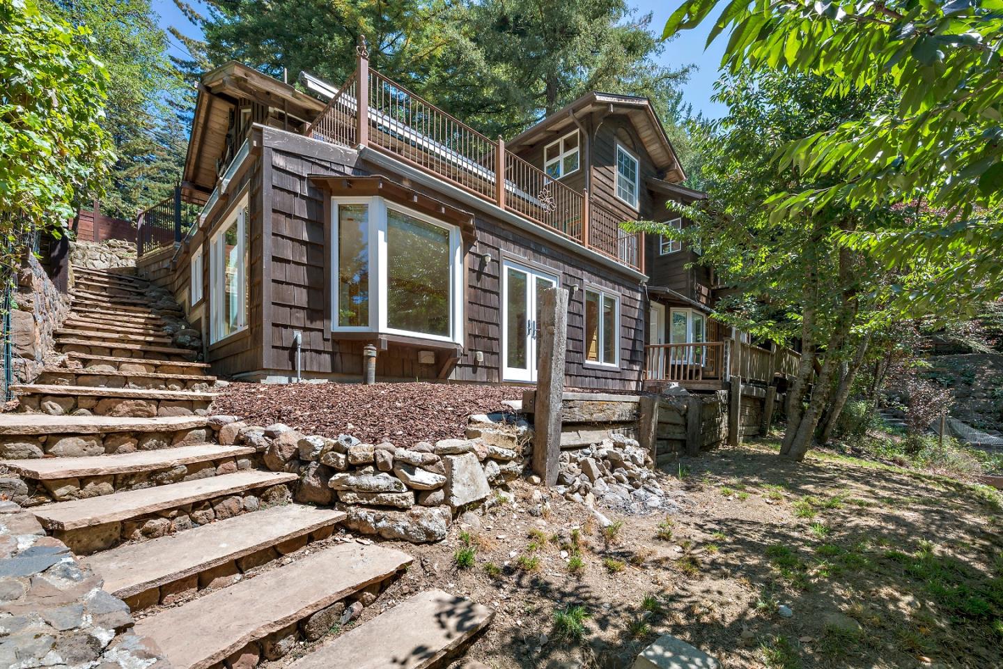 41 Skyline Drive Woodside, CA 94062 - Photo 29 of 30 a front view of a house with a garden