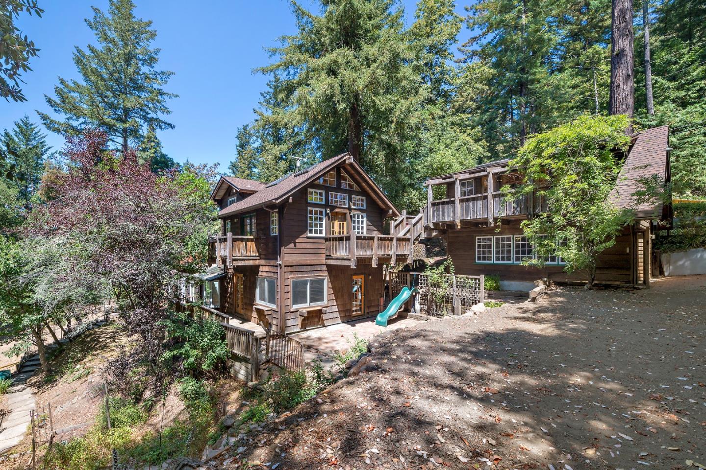 41 Skyline Drive Woodside, CA 94062 - Photo 30 of 30 a view of a house with a yard and large trees