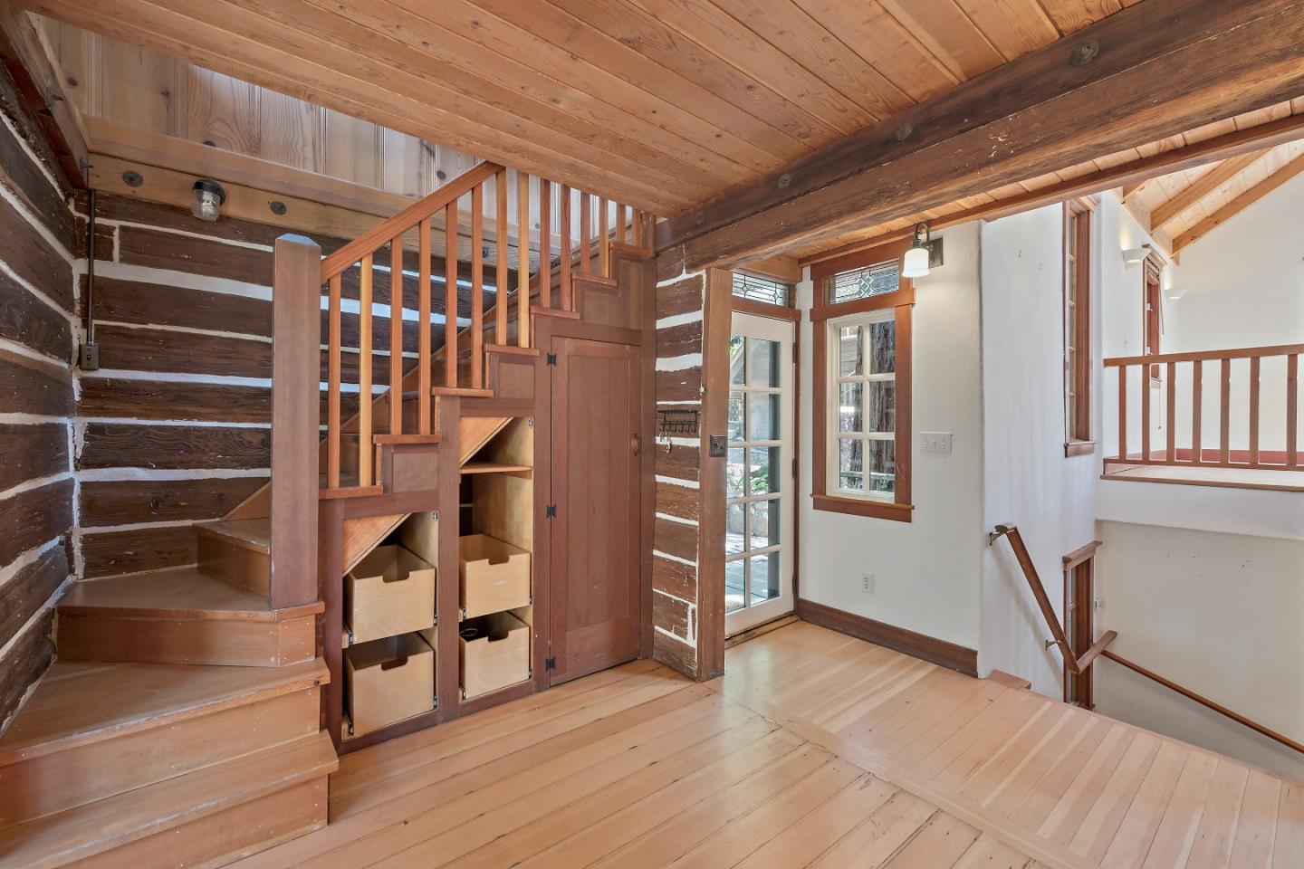 41 Skyline Drive Woodside, CA 94062 - Photo 5 of 30 a view of an entryway with wooden floor and windows