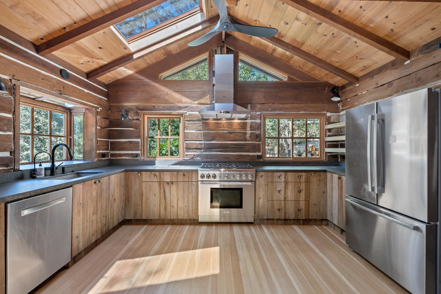 41 Skyline Drive Woodside, CA 94062 - Photo 6 of 30 a kitchen with granite countertop stainless steel appliances a stove and a refrigerator