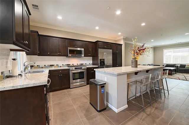 a kitchen with a stove and a microwave