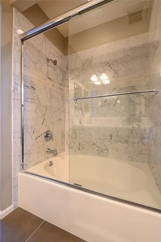 a utility room with closet dryer and washer