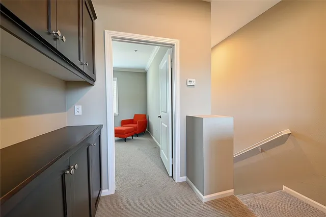 a front view of residential houses with stairs