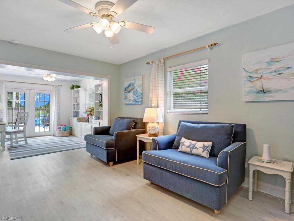 856 98th Avenue North Naples, FL 34108 - Photo 15 of 28 These chairs each pull out to form twin beds.