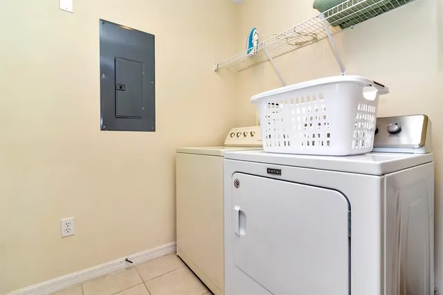 a utility room with dryer and washer