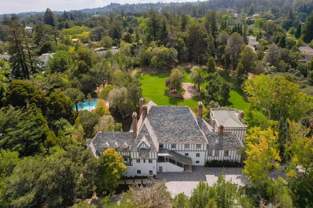 a view of outdoor space with deck and tree