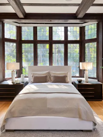 a view of a patio with a table and chairs under an umbrella