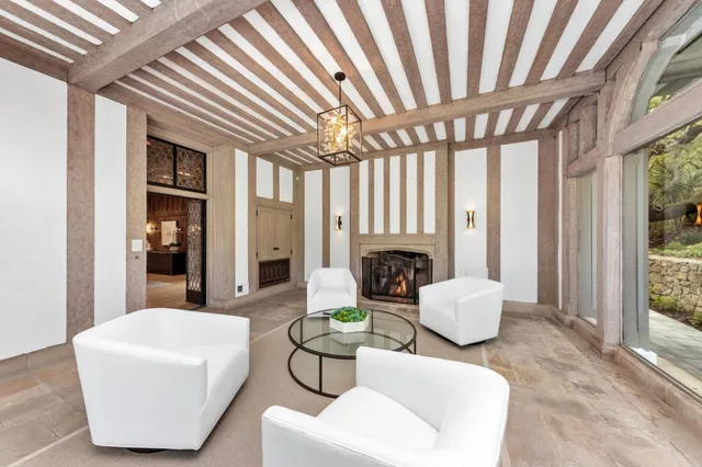 a view of a pathway of a house with a tree