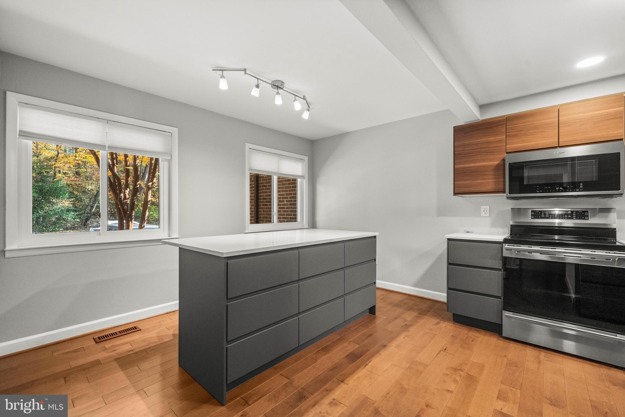 2152 Glencourse Lane Reston, VA 20191 - Photo 11 of 52 a bathroom with a sink and a microwave