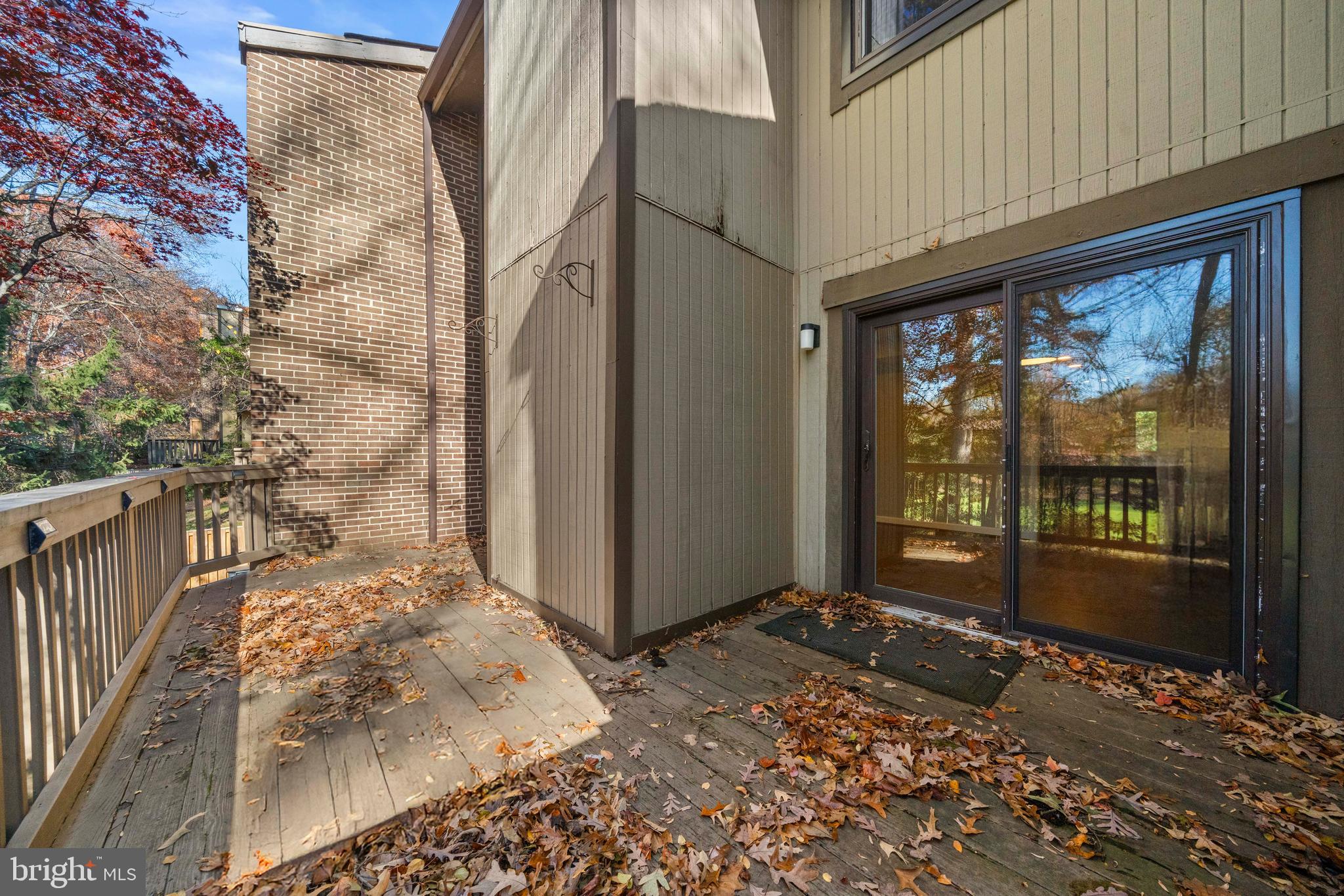 2152 Glencourse Lane Reston, VA 20191 - Photo 14 of 52 a view of a brick house with a large tree